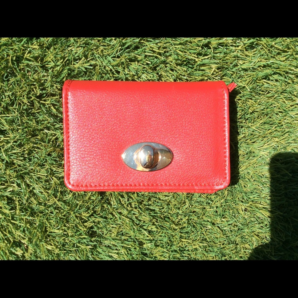 Red coin wallet with flower pattern pouches inside